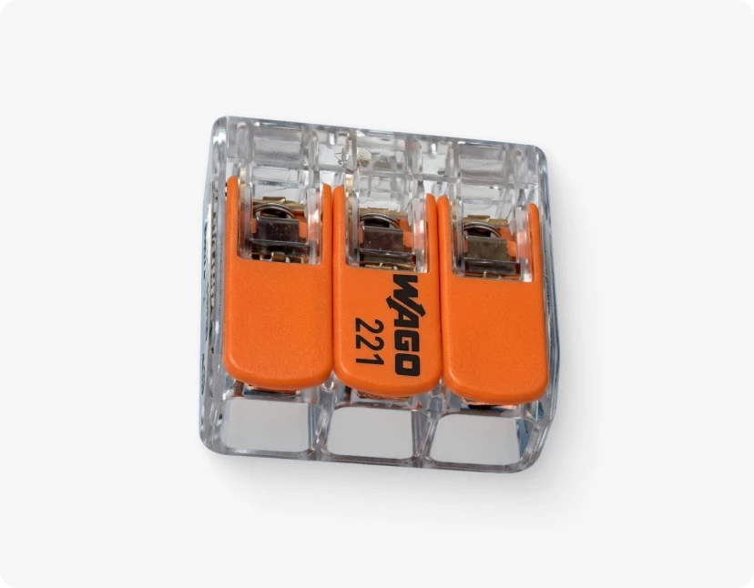 ARMOR™ A clear plastic housing with three orange, rectangular, metal-clip, metal-protective, metal-protective,