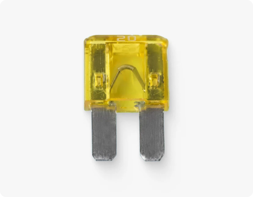 A yellow and silver 2-pin automotive fuse, part of the ARMOR™ product line, used in various applications to protect