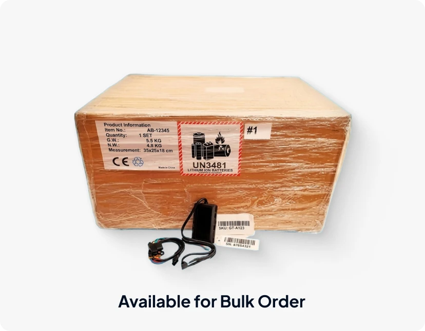 Bulk shrink-wrapped shipping box labeled with UN3481 lithium-ion battery warning, displayed next to an industrial control module kit, labeled "Available for Bulk Order".