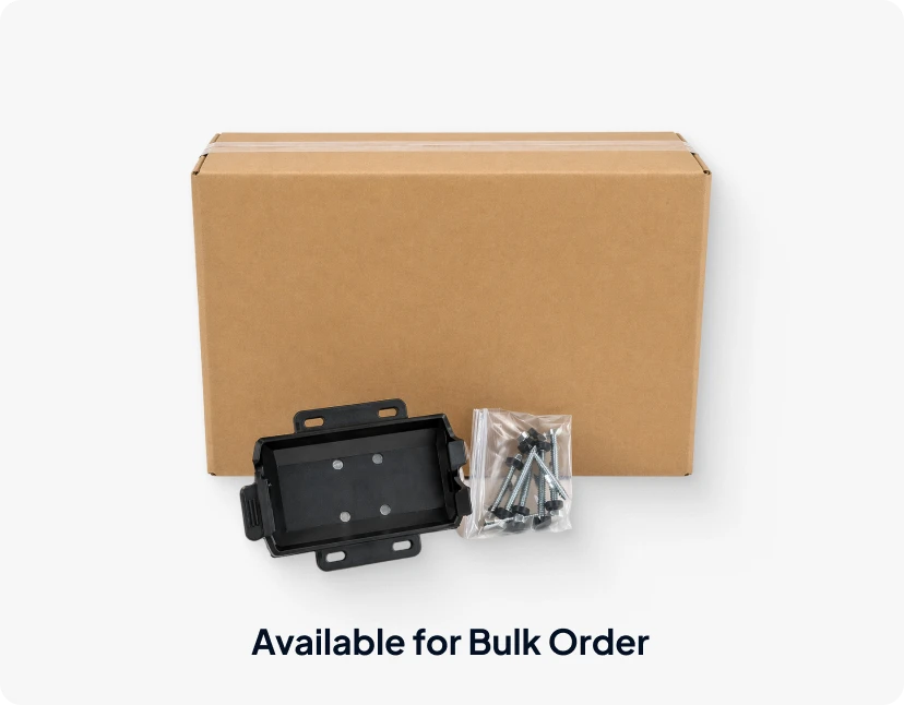 Bulk cardboard shipping box displayed with a black mounting cradle and a bag of assembly screws in front, labeled "Available for Bulk Order".
