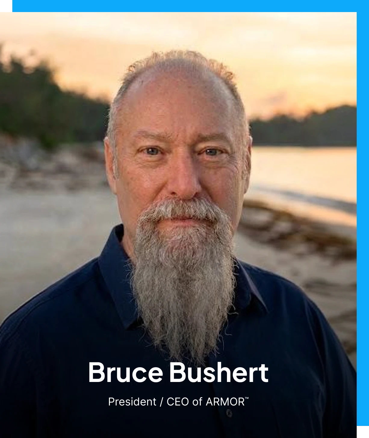 Portrait of Bruce Bushert, President and CEO of ARMOR™, with a calm, natural background
